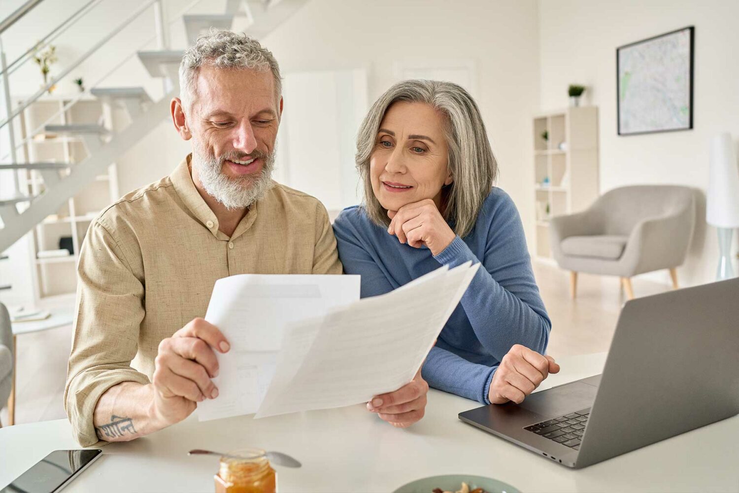 mature couple checking documents