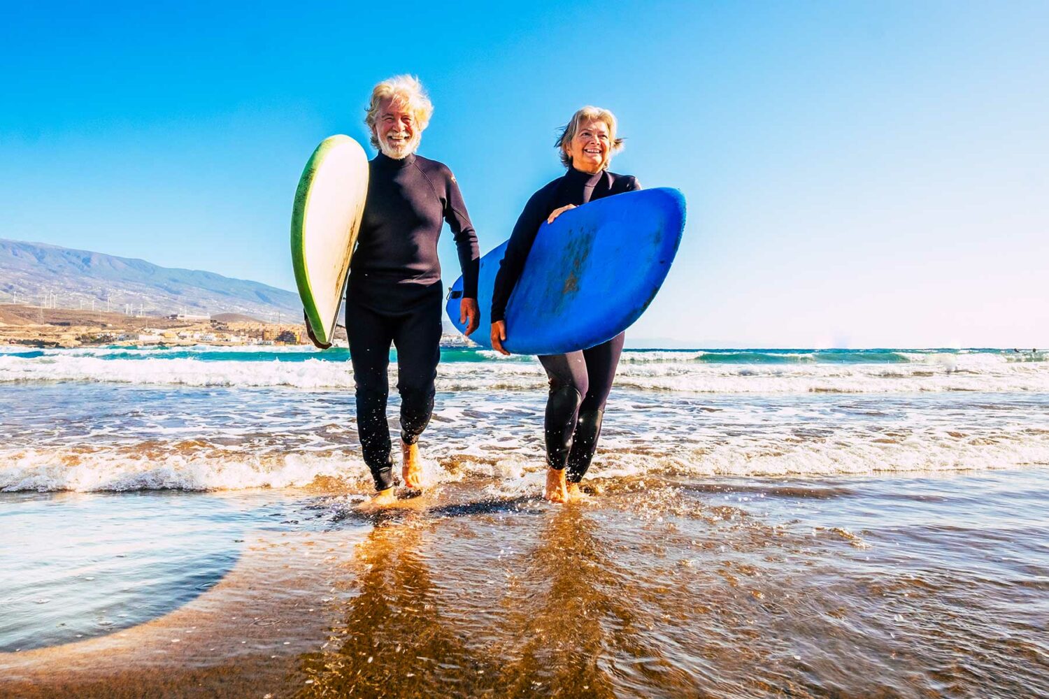 mature couple surfing